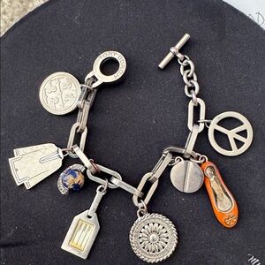 Rare Tory Burch silver charm bracelet 692/1000 pieces. no dust bag/box. Thanks!